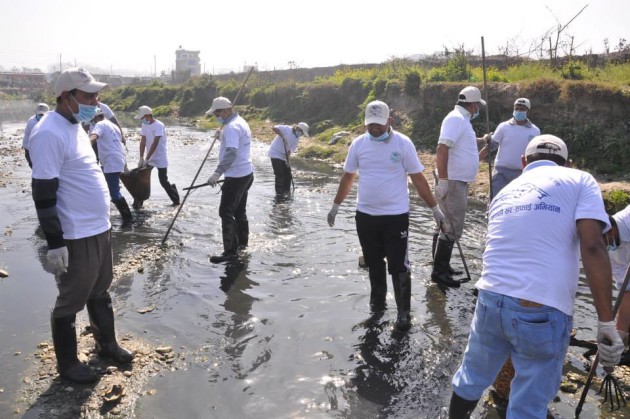 People involved in cleaning Bagmati River of Kathmandu. The initiative is being continued since 124 weeks to clean holy river of Kathmandu.