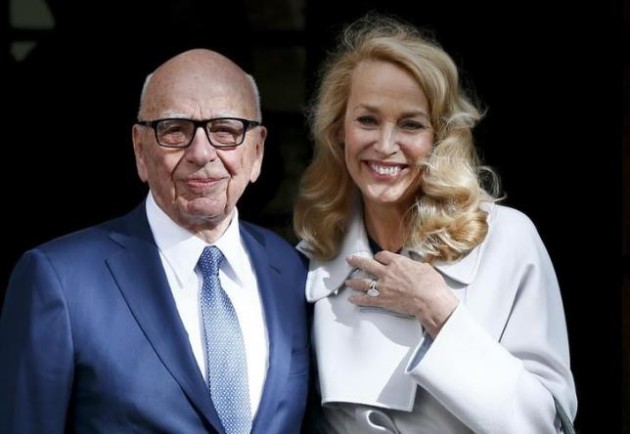 Media mogul Rupert Murdoch and Jerry Hall pose for a photograph in London