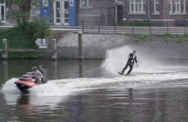 YouTube-star-wakeboards-through-Amsterdam-canals-while-wearing-a-tuxedo
