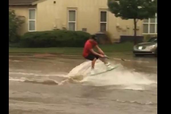 Texas-tech-student-wakeboards-on-flooded-Lubbock-road