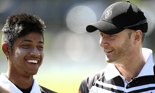 SYDNEY, AUSTRALIA - SEPTEMBER 24:  Michael Clarke and Sandeep Lamichhane speak to the media during the innings break during the Mosman v Western Suburbs first grade match at Allan Border Oval on September 24, 2016 in Sydney, Australia.  (Photo by Mark Metcalfe/Getty Images)