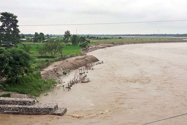 A flooded Kankai River flows in Kotihom area of Jhapa district, on Monday, July 25, 2016. Photo: RSS